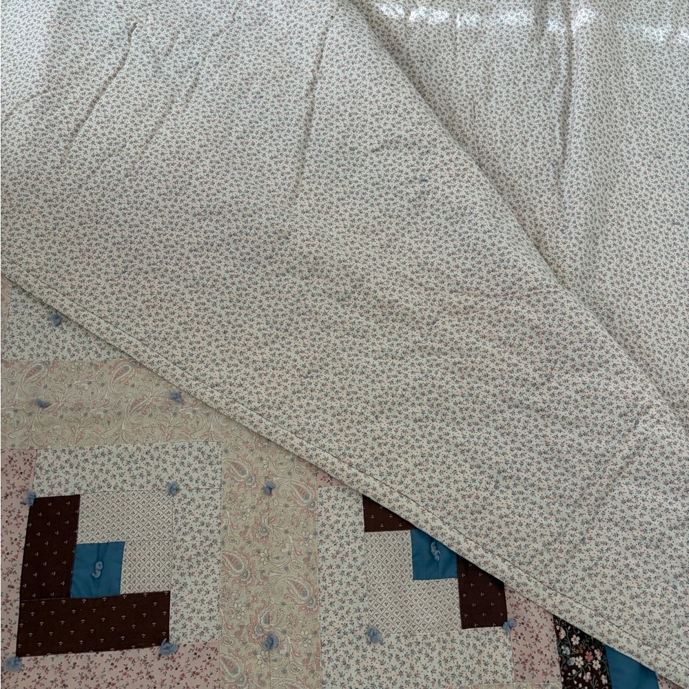 Elegant Patchwork Quilt with Brown, Cream, and Blue Accents - Picture 4 of 4